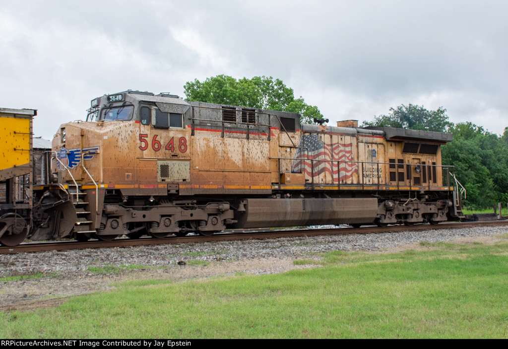 UP 5648 is the rear DPU on a westbound coal train 